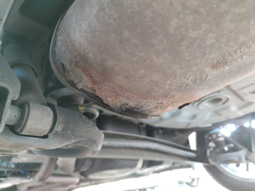 Rost am Endschalldämpfer eines Fiat 500